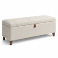 Banc de rangement en tissu beige avec pieds en bois