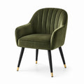 Chaise en velours vert avec pieds en métal noir et or