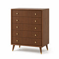 Commode en bois marron avec poignées dorées à cinq tiroirs