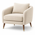 Fauteuil en tissu beige avec pieds en bois